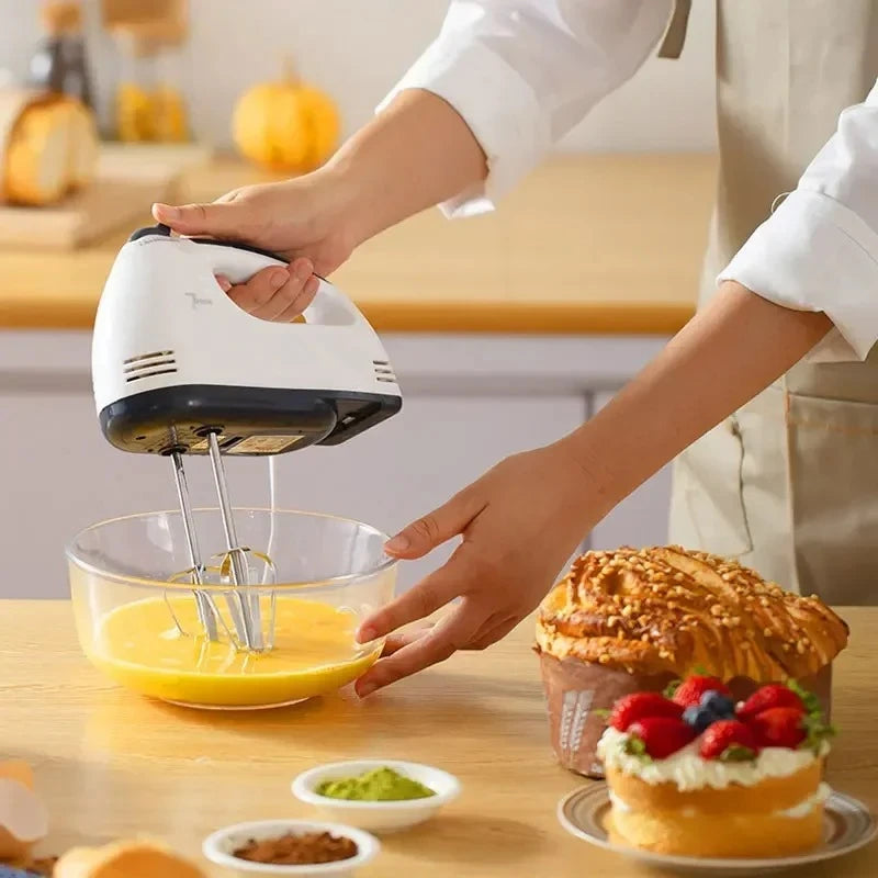 This multipurpose kitchen mixing appliance is a 7-speed electric hand mixer that automatically blends cream, eggs, cake, and dough.